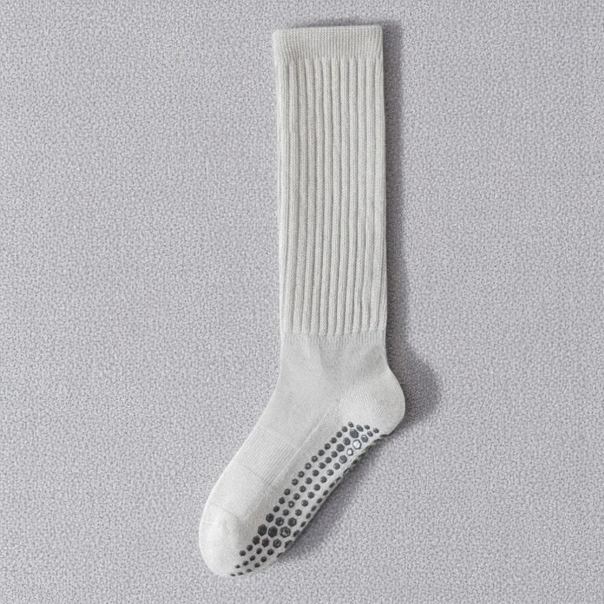 Chaussette antidérapante gris clair femme, avec semelle à picots pour une bonne adhérence.