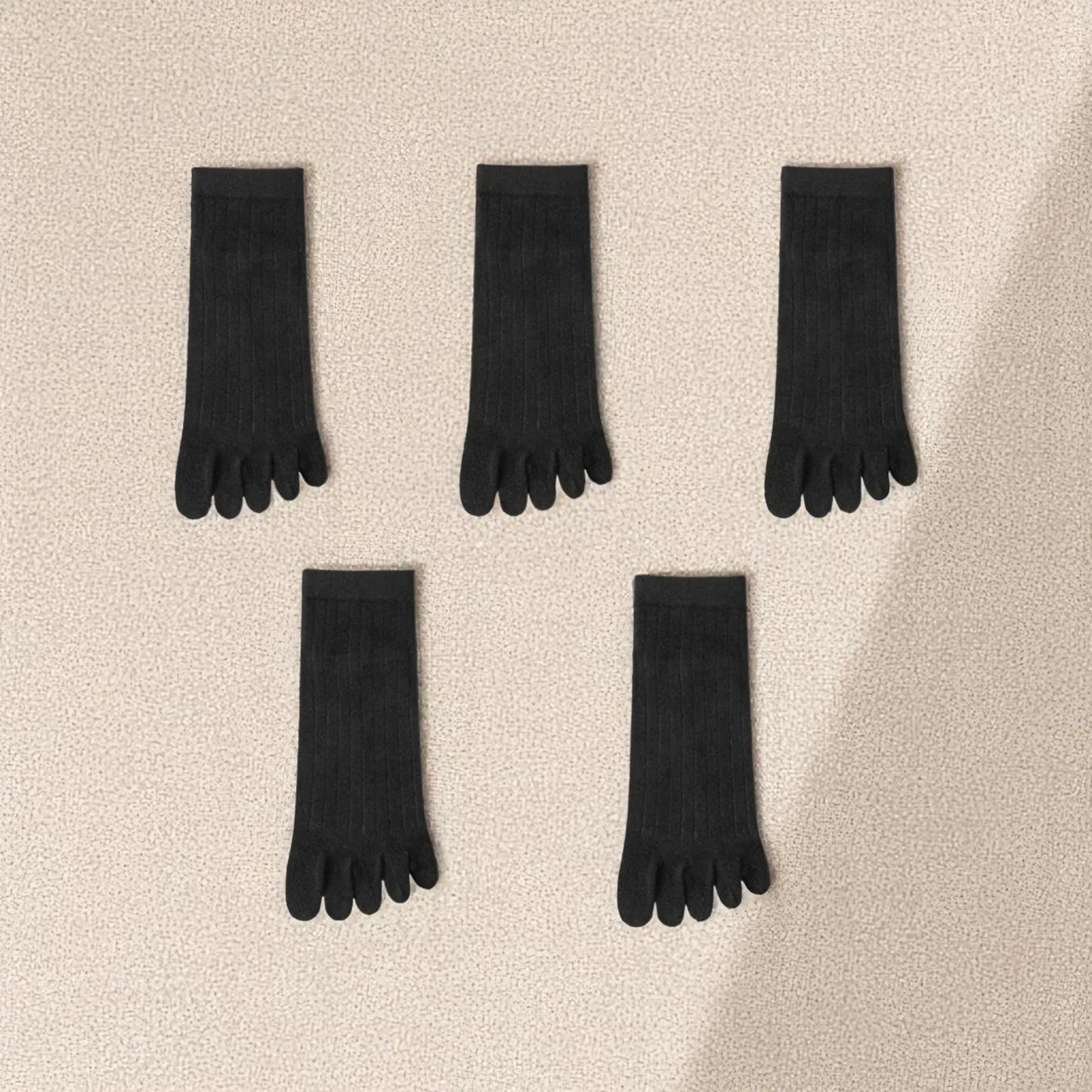 Chaussettes noires à orteils séparés pour homme, idéales au quotidien.