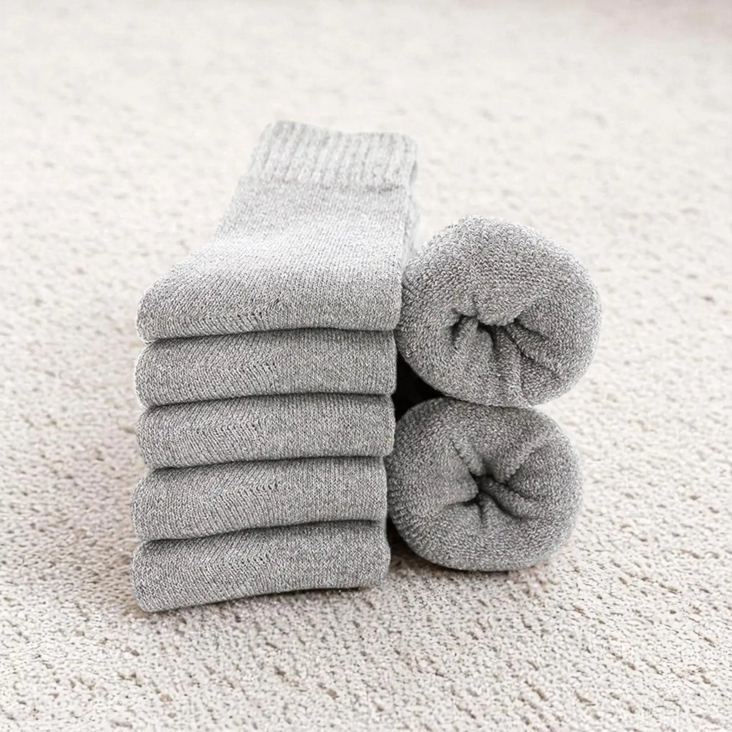 Chaussettes laine gris clair homme confort thermique optimal.