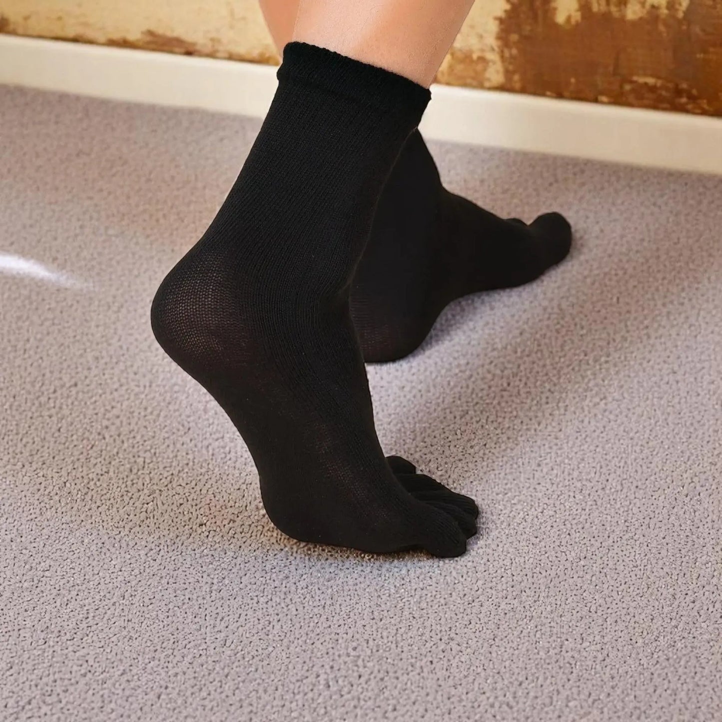 Chaussettes noires à doigts pour homme – style discret, parfaite tenue et liberté de mouvement pour les orteils.