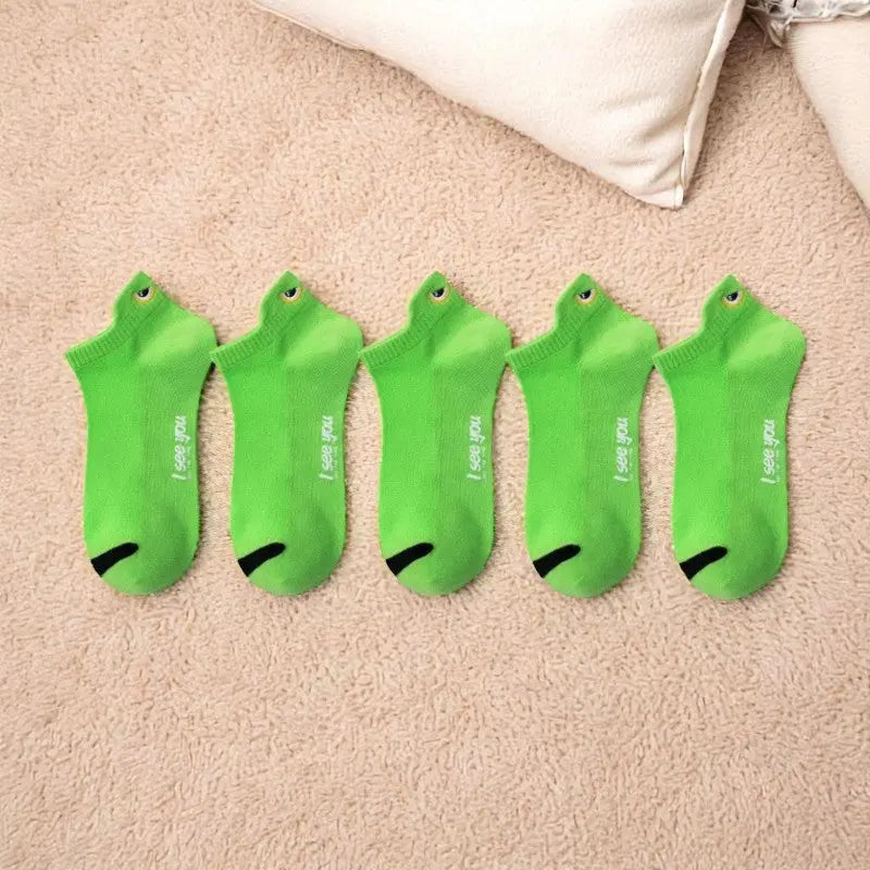 Socquettes vertes pour homme avec décoration œil.