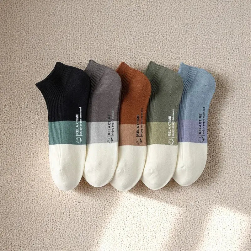 Lot de 5 socquettes homme couleurs variées.