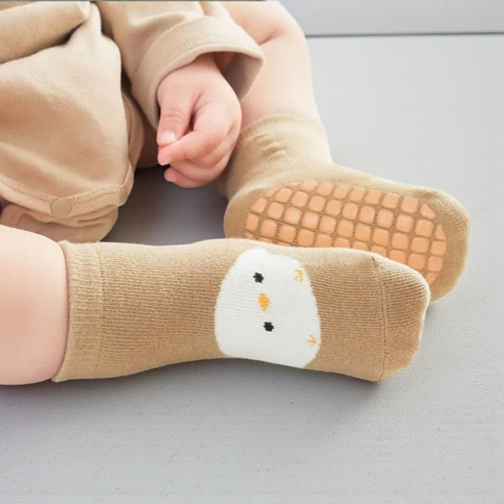 Chaussette antidérapante bébé avec semelle antiglisse, idéale sur carrelage.
