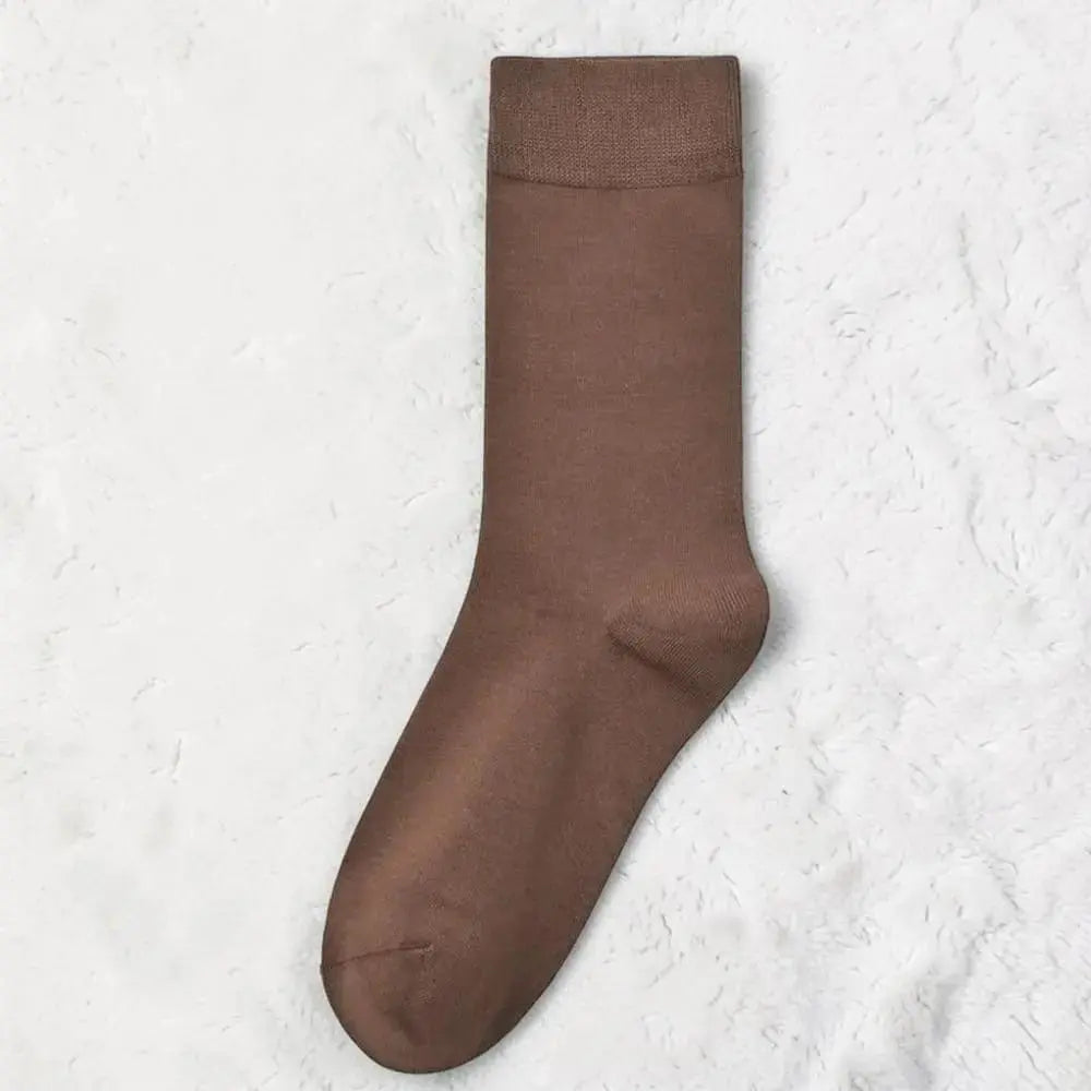 Chaussette sans couture marron élégante et agréable à porter.