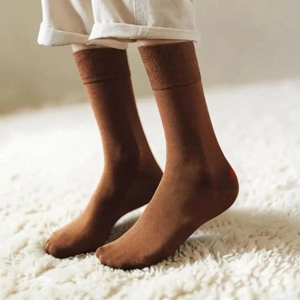 Chaussettes sans couture portées offrant un confort optimal sans frottement.