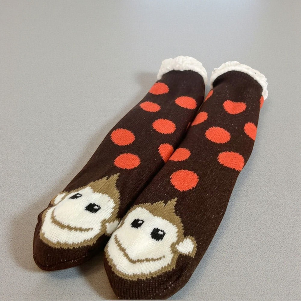 Chaussettes chausson enfant avec motifs ludiques et matière douce.