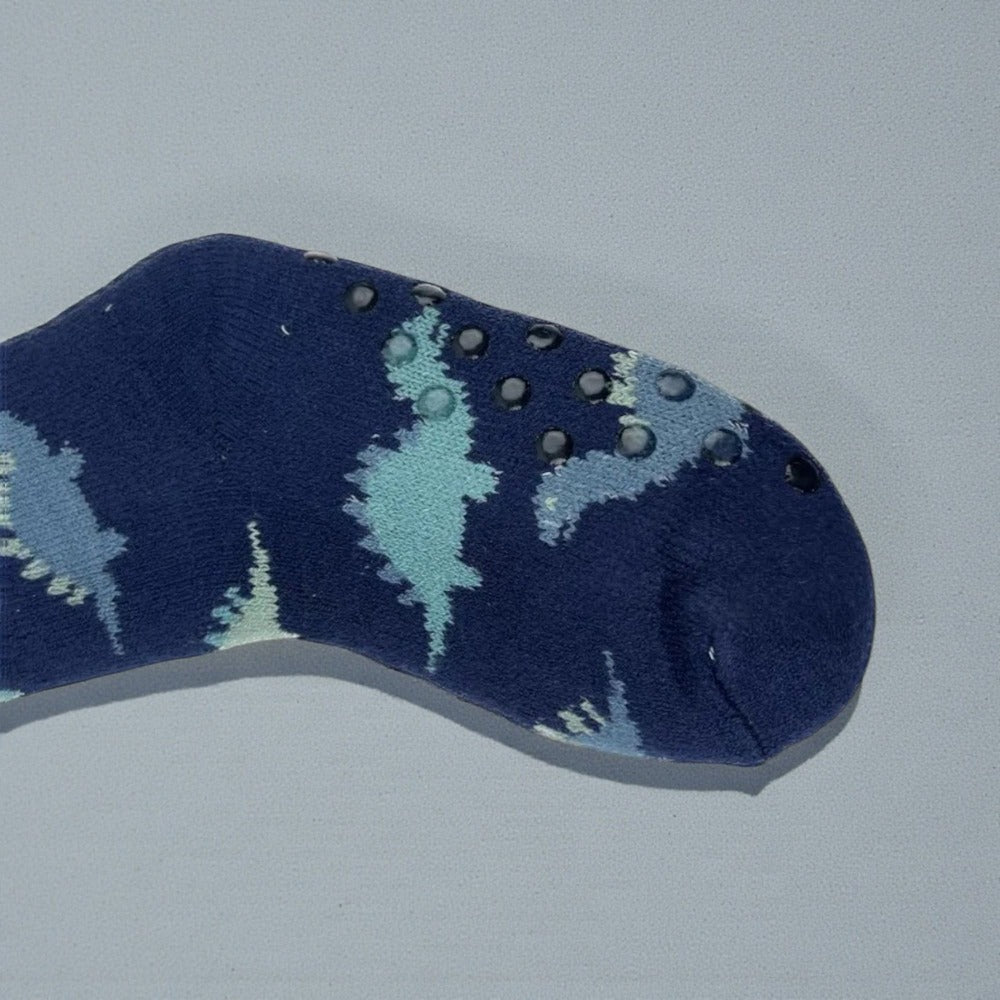 Chaussettes chausson enfant avec semelle antidérapante pour éviter les glissades à la maison.
