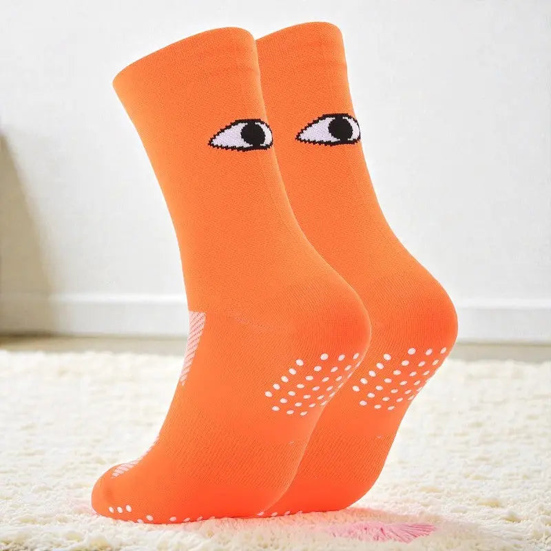 Chaussettes cyclisme orange dynamique idéale pour entraînement vélo.