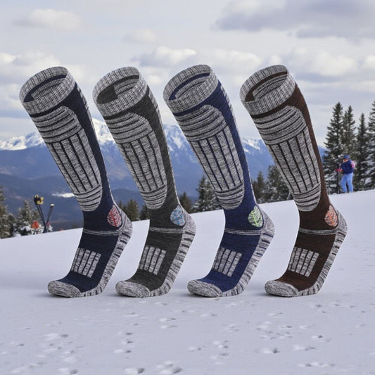 Chaussettes de ski multicolores avec protection tibia et talon pour le ski.