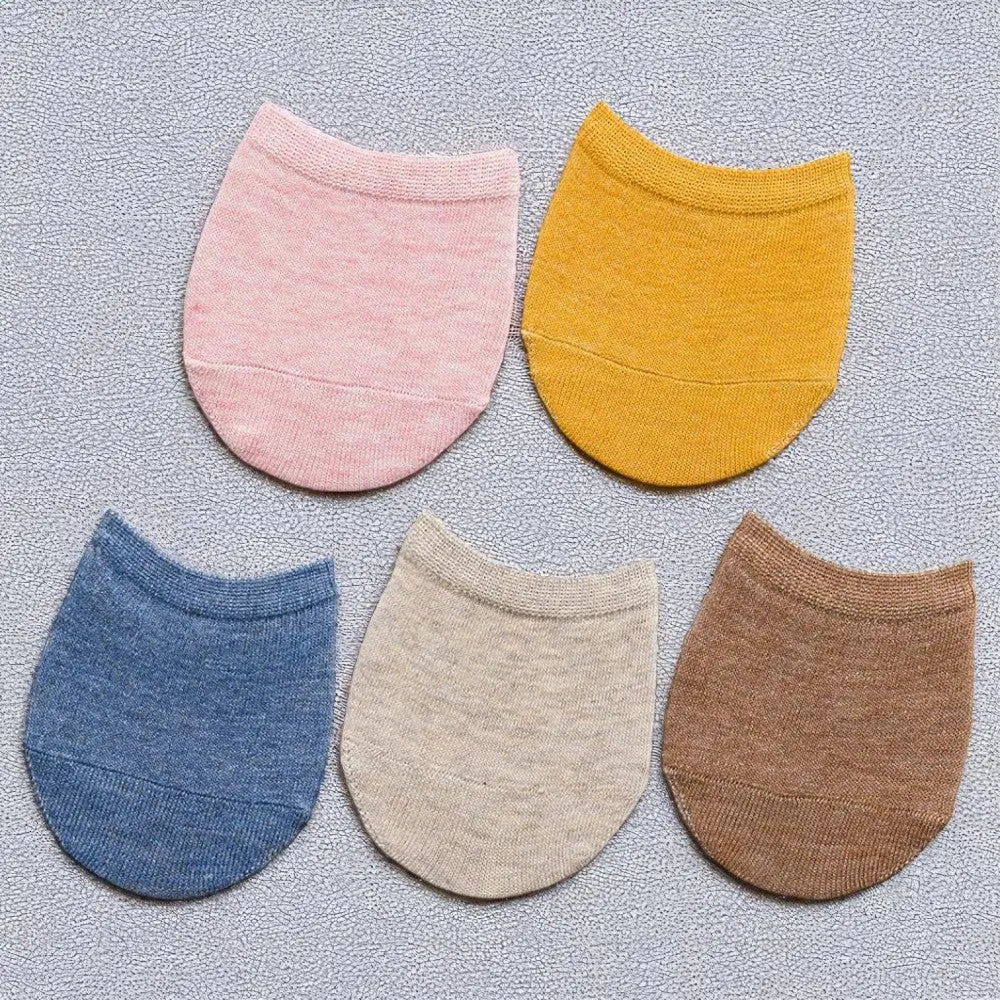 Chaussettes invisibles demi-pied aux teintes douces, présentées à plat en lot de cinq.