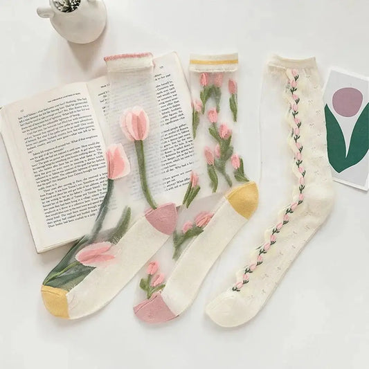 Chaussettes dentelle femme transparentes avec motifs fleurs élégantes.