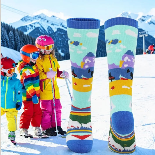 Chaussettes ski enfant bleue motif ski et neige confortable.