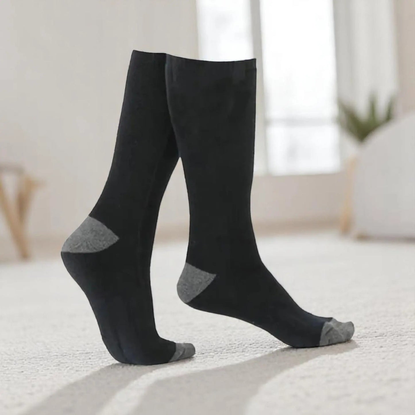 Chaussettes thermiques homme noires renforcées chaleur hiver.