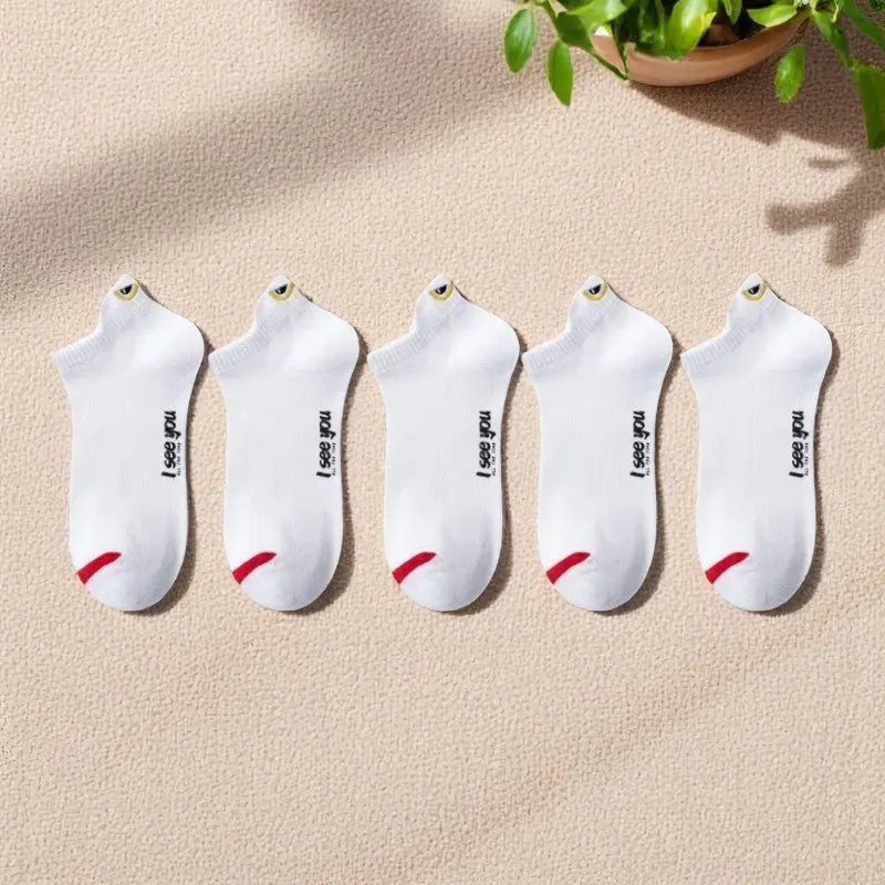Socquettes blanches pour homme avec détail œil brodé.
