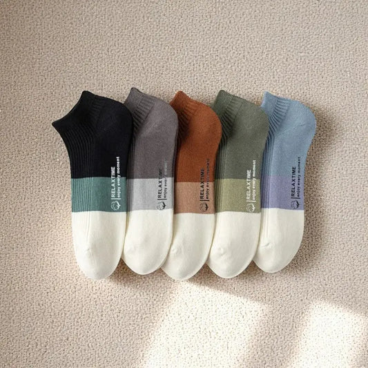 Lot de 5 socquettes homme couleurs variées.