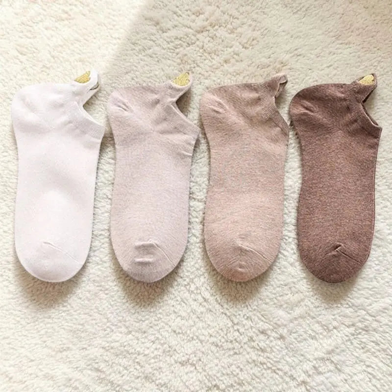 Lot de socquettes femme coloris blanc, rose et beige avec languette talon.