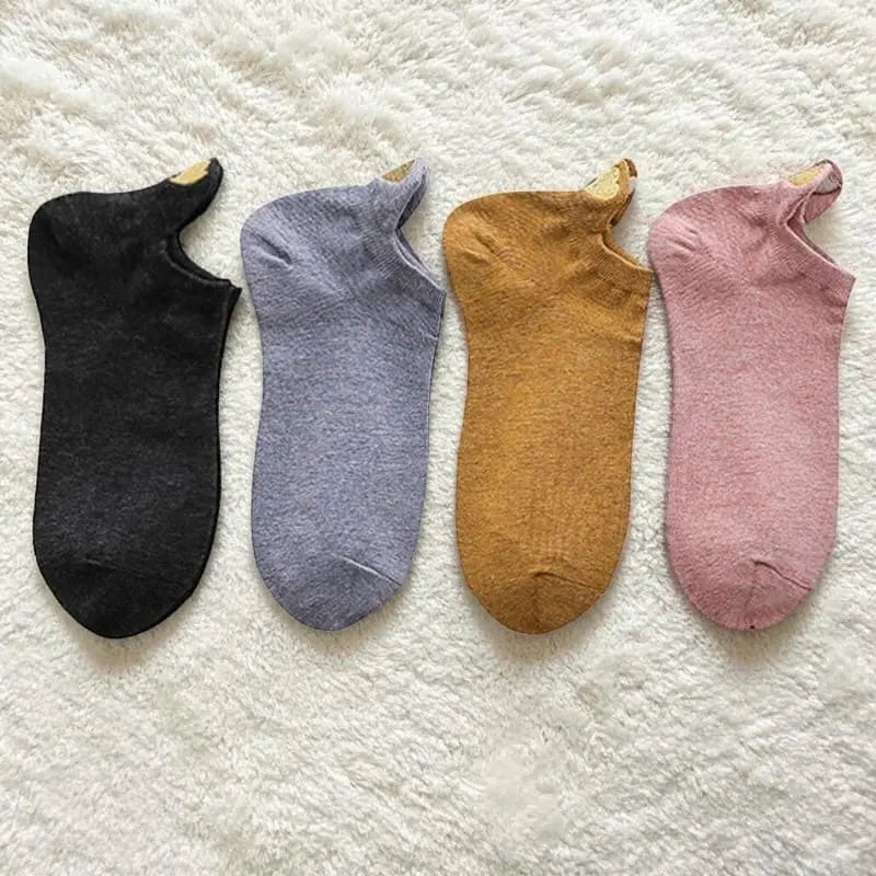 Lot de socquettes femme coloris noir, bleu, camel et rose avec languette talon.